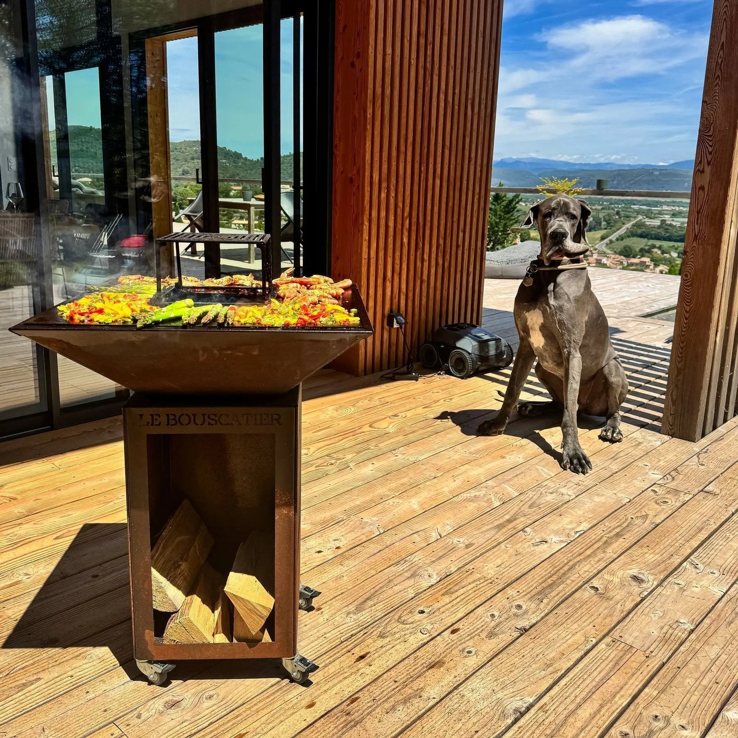 Lou provençau-Brasero plancha en acier corten avec rangement bûches-grille et stop food inclus